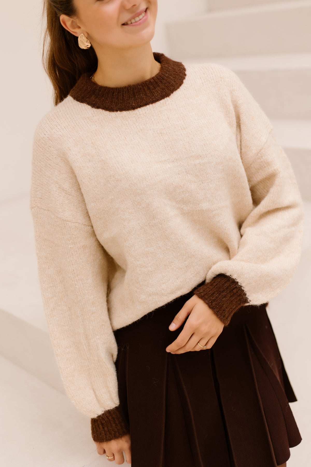 Sweater beige met bruine rand